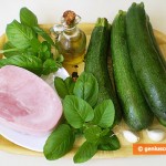 Ingredient for salad with zucchini, ham, mint
