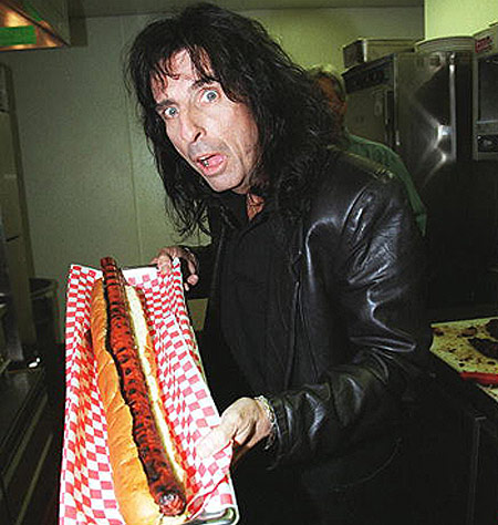 Alice Cooper with the giant hot dog