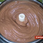 Chocolate ice cream in the bowl of ice cream machine