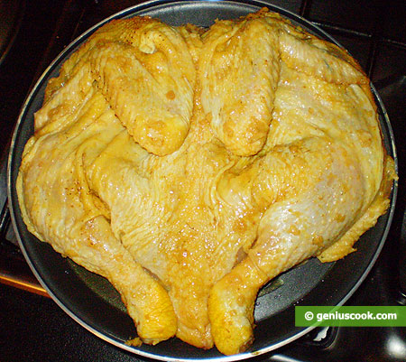chicken on a frying pan