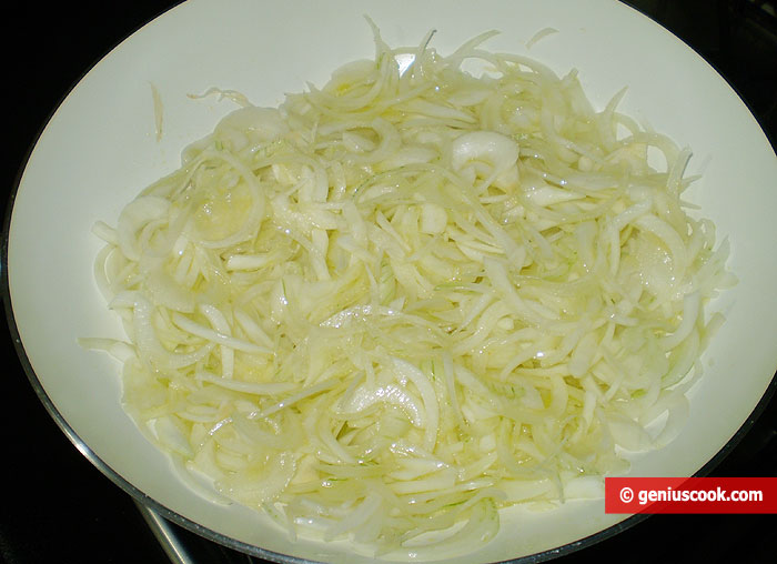 Onion into the saucepan